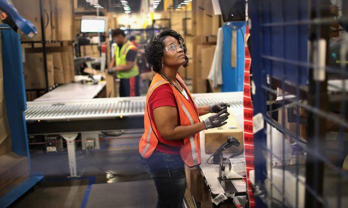 Amazon CEO Says Job Cuts Will Run Through Next Year