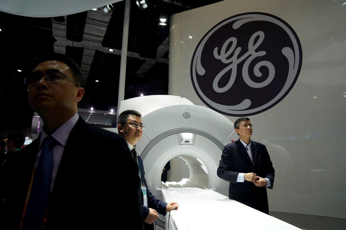 A General Electric sign during the China International Import Expo in Shanghai on Nov. 6, 2018. Federal prosecutors charged two Chinese men with stealing information related to GE’s turbine technology for the benefit of the Chinese regime. (Reuters/Aly Song)