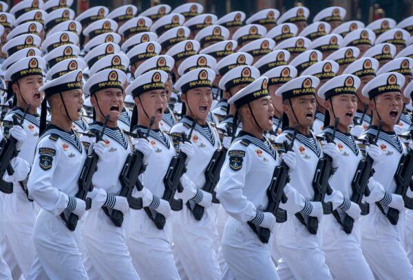 Chinese navy sailors march in formation during a parade to celebrate the 70th Anniversary of the founding of the Chinese Communist Party at Tiananmen Square in 1949 in Beijing, China on Oct. 1, 2019. (Kevin Frayer/Getty Images)