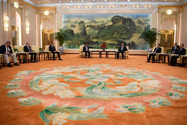 Tedros Adhanom, director-general of the World Health Organization (Center L) attends a meeting with Chinese regime leader Xi jinping (Center R) at the Great Hall of the People in Beijing on Jan. 28, 2020.(Kyodo News/Naohiko Hatta/Pool)