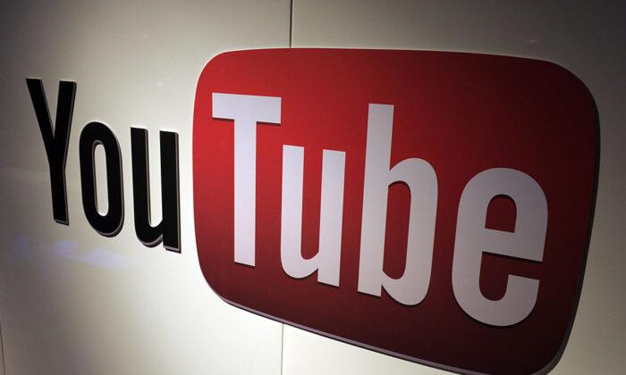 YouTube logo on display during LeWeb Paris 2012 on Dec. 4, 2012. (Eric Piermont/AFP via Getty Images)