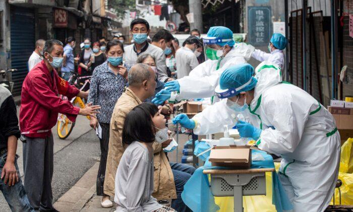 Wuhan Residents View Mandatory Virus Tests As the CCP Money Making Scheme; Second wave in Shanghai?