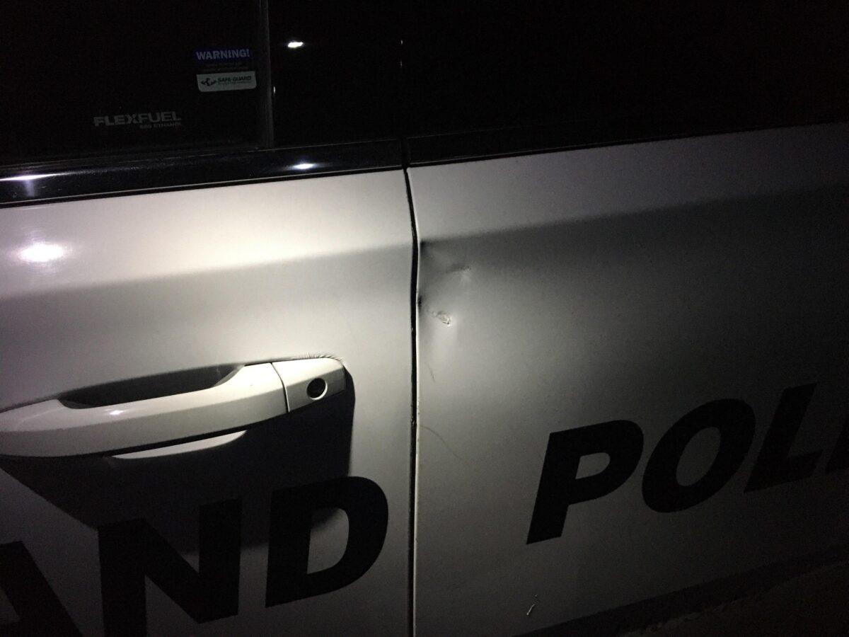 Dents left in a police car from rocks that were thrown at police officers on Aug. 15, 2020. (Portland Police Bureau)