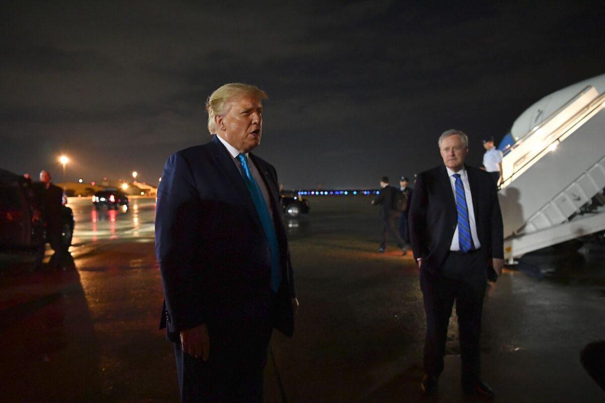 President Donald Trump next to White House chief of staff Mark Meadows, speaks to reporters upon arrival at Andrews Air Force Base in Maryland on Sept. 3, 2020. (Mandel Ngan/AFP via Getty Images)