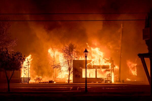 Buildings are engulfed in flames as a wildfire ravages the central Oregon town of Talent near Medford, Ore., on Sept. 8, 2020. (Kevin Jantzer via AP)
