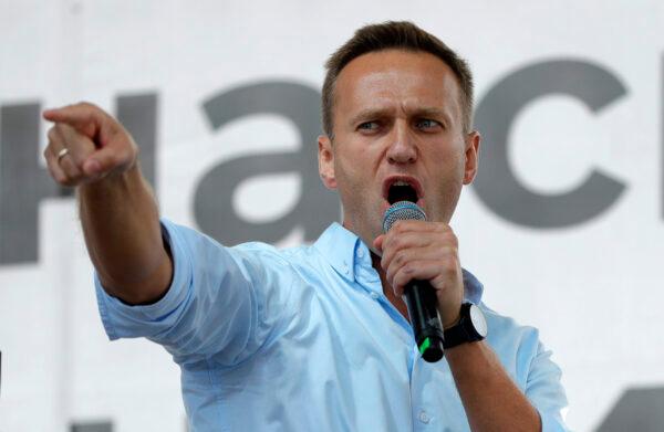 Russian opposition activist Alexei Navalny gestures while speaking to a crowd during a political protest on in Moscow, on July 20, 2019. (Pavel Golovkin/AP Photo)