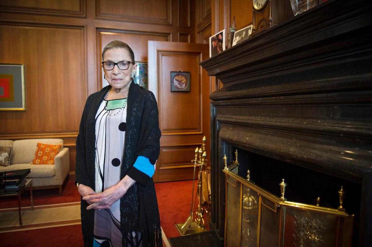 Associate Justice Ruth Bader Ginsburg is seen in her chambers at the Supreme Court in Washington on July 31, 2014. (AP Photo/Cliff Owen)