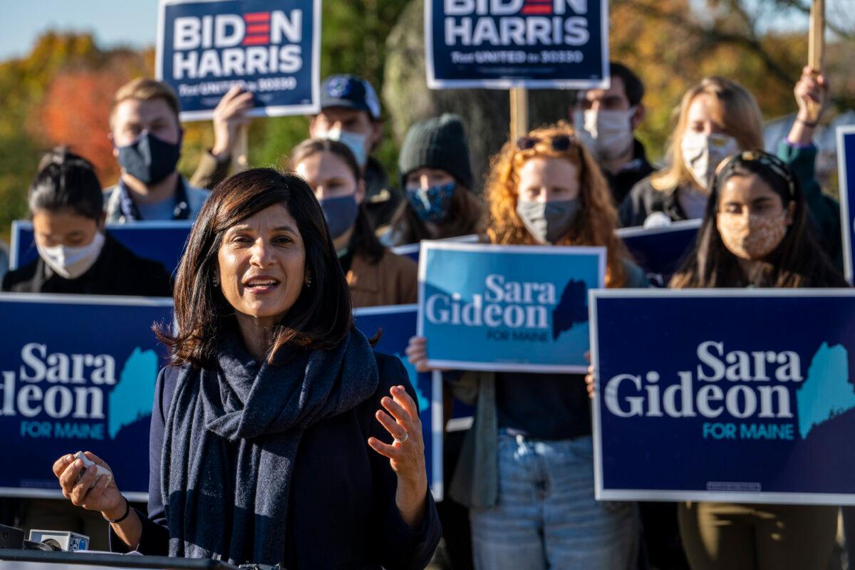 Democratic Senate candidate Sara Gideon talks to the press after she filled out her absentee ballot to vote in person at the town hall in Freeport, Maine on Oct. 14, 2020. (Sarah Rice/Getty Images)