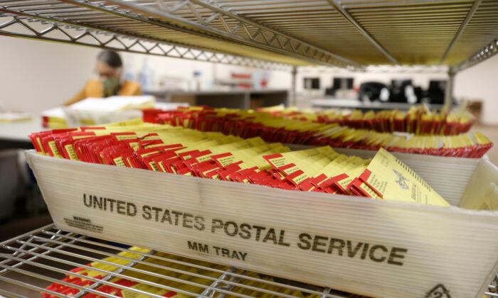 USPS Worker Charged After Being Arrested at Canadian Border With Stolen Ballots