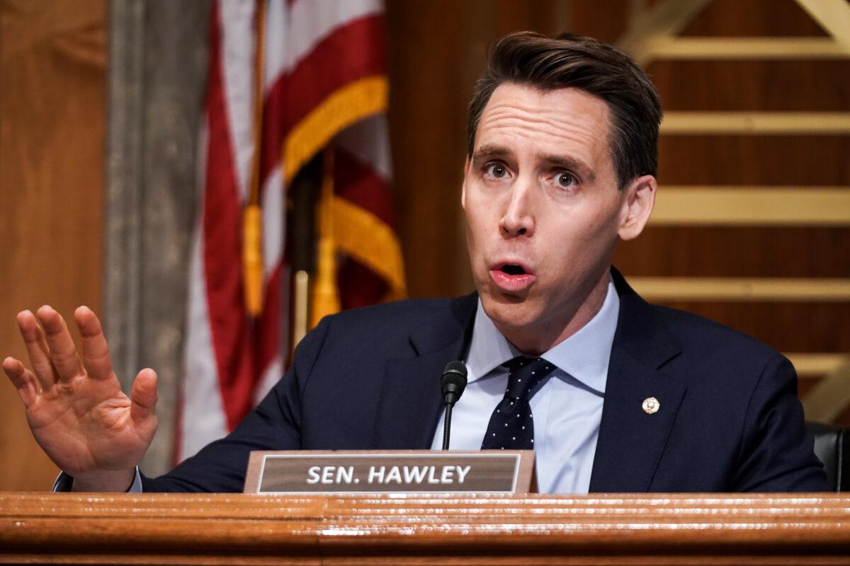 Sen. Josh Hawley (R-Mo.) asks questions during a Senate Homeland Security and Governmental Affairs Committee hearing to discuss election security and the 2020 election process in Washington on Dec. 16, 2020. (Greg Nash-Pool/Getty Images)