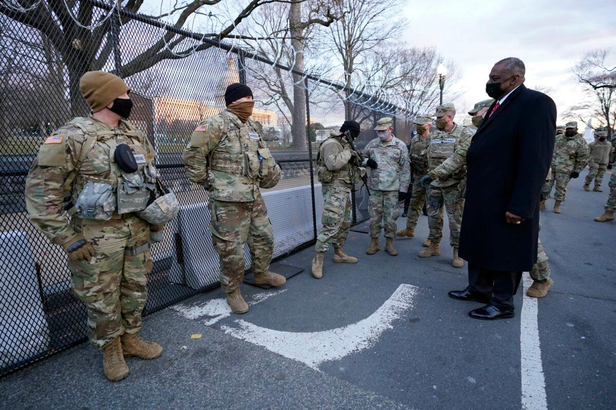 Secretary of Defense Lloyd Austin visits National Guard troops deployed at the U.S. Capitol and the surrounding area, in Washington on Jan. 29, 2021. (Manuel Balce Ceneta/Pool/Getty Images)