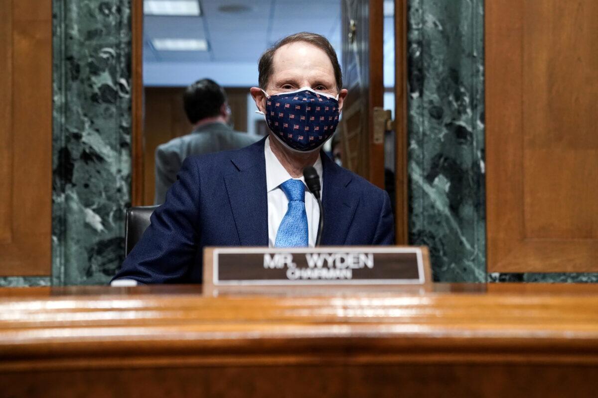 Sen. Ron Wyden (D-Ore.) attends a Senate Finance Committee hearing in Washington on Feb. 23, 2021. (Greg Nash/Pool via Reuters)
