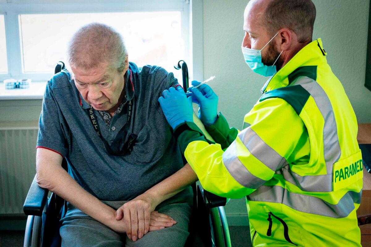 A man receives a COVID-19 vaccine in Aalborg, Denmark on March 5, 2021. (Bo Amstrup/Ritzau Scanpix/AFP via Getty Images)