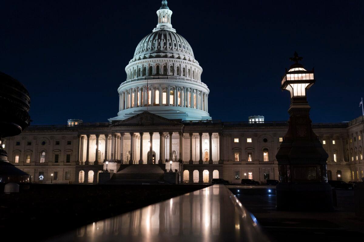 The U.S. Capitol is seen at dusk in Washington on March 5, 2021. (J. Scott Applewhite/AP Photo)