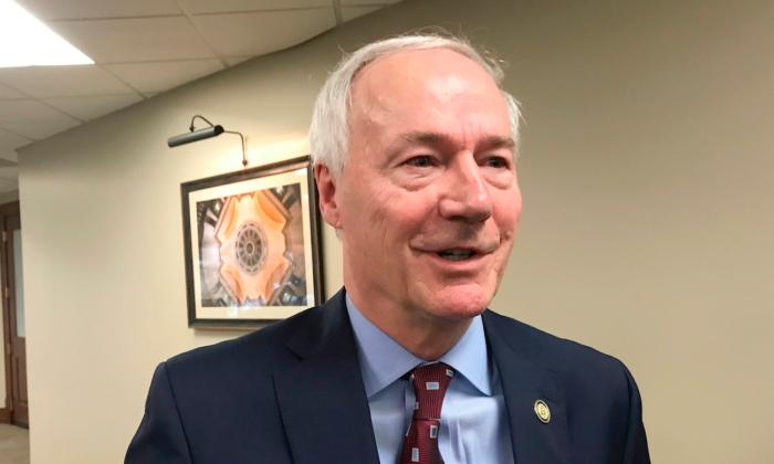 Arkansas Governor Allows Bill Requiring Vaccine Opt-Outs to Become Law