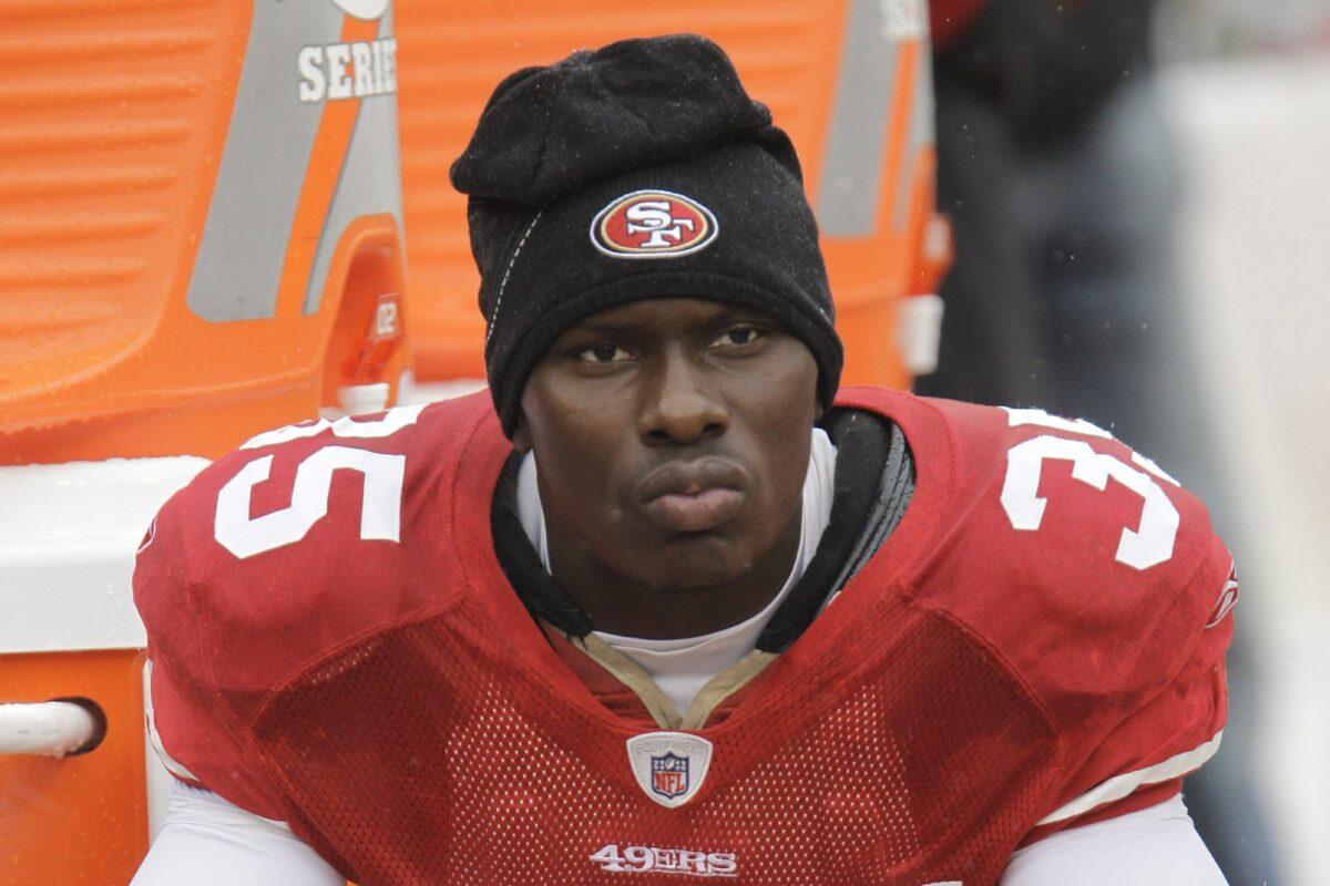 San Francisco 49ers cornerback Phillip Adams sits on the sideline during the first quarter of an NFL football game in San Francisco, California on Oct. 17, 2010. (Paul Sakuma/File Photo via AP)
