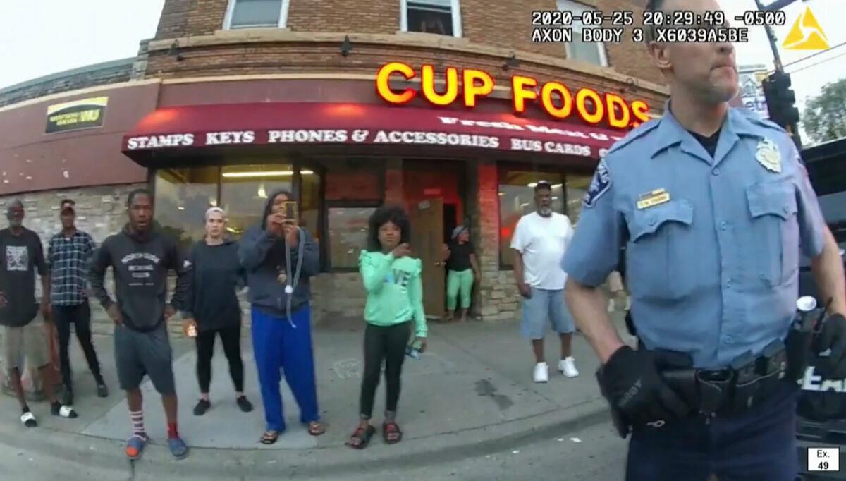 In this image from police body camera footage, then-Minneapolis police officer Derek Chauvin stands outside Cup Foods in Minneapolis, on May 25, 2020, as shown in the trial of Chauvin at the Hennepin County Courthouse in Minneapolis, on April 19, 2021. (Court TV via AP/Pool)