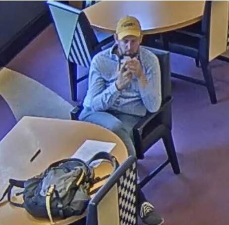 Surveillance footage of what appears to be Seth Andrew inside a bank in 2019. (Justice Department)