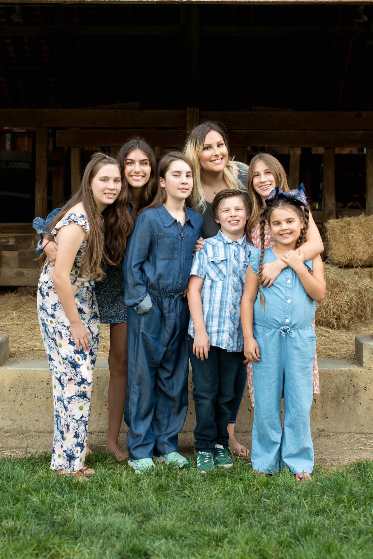 Meredith's seven kids. (Denise Beatty Photography/Caters News)