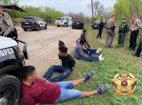 Uvalde County sheriff's deputies, along with Texas State Troopers and Border Patrol, apprehend illegal aliens being smuggled by vehicle in Uvalde County on April 3, 2021. (Uvalde County Sheriff's Office)