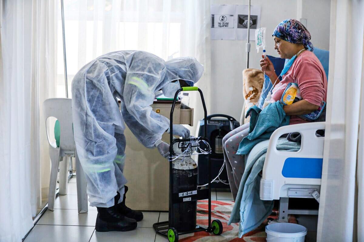 A patient is treated in a hospital in Johannesburg, in a file photograph. (Sumaya Hisham/Reuters)