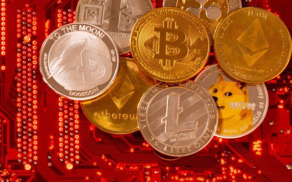 Representations of cryptocurrencies Bitcoin, Ethereum, DogeCoin, Ripple and Litecoin in a file photo. (Dado Ruvic/Reuters)