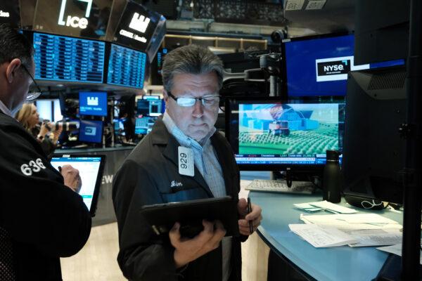 Traders work on the floor of the New York Stock Exchange (NYSE) in New York City on May 2, 2022. (Spencer Platt/Getty Images)