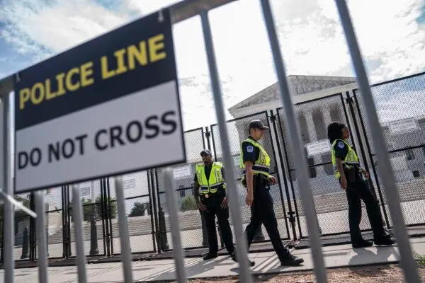 U.S. Capitol Police guard a security fence surrounding the Supreme Court in Washington on June 8, 2022. (Nathan Howard/Getty Images)