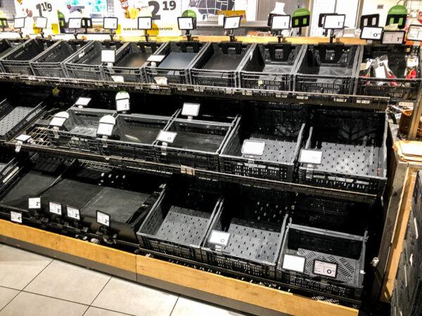 A supermarket with empty shelves is a result of delays in truck deliveries brought about by farmer and trucker protests in The Netherlands on July 5, 2022. (Special to The Epoch Times)