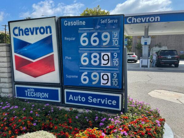 Gas prices are advertised at a Chevron station as rising inflation and oil costs affect the consumers in Los Angeles, Calif., on June 13, 2022. (Lucy Nicholson/Reuters)
