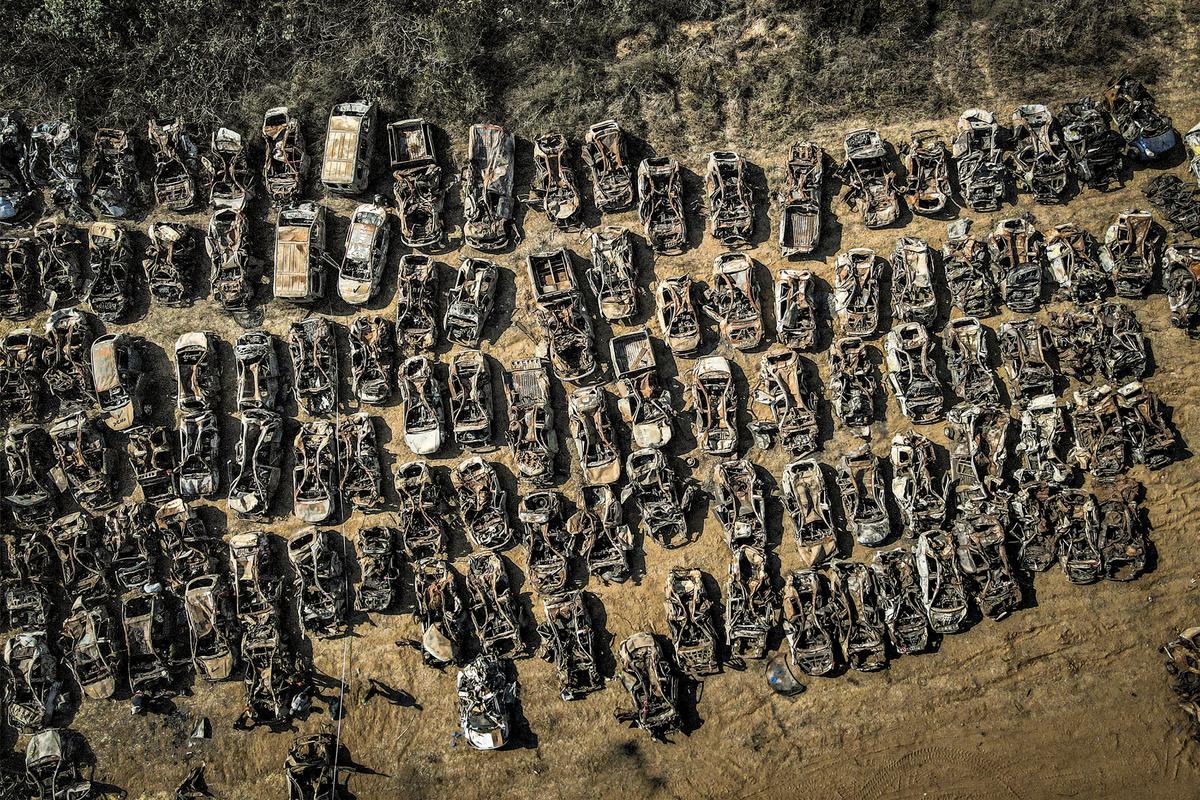 An aerial view shows some of the hundreds of vehicles that were destroyed in the Oct. 7, 2023, attack carried out by Hamas terrorists, after they had been collected and transported outside the city of Netivot in southern Israel on Nov. 1, 2023. (JACK GUEZ/AFP via Getty Images)