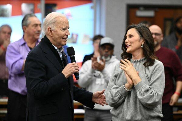 President Joe Biden speaks alongside Michigan Gov. Gretchen Whitmer (R) during a visit to a United Auto Workers' phone bank in the metropolitan Detroit area on Feb. 1, 2024. (Mandel Ngan/AFP via Getty Images)
