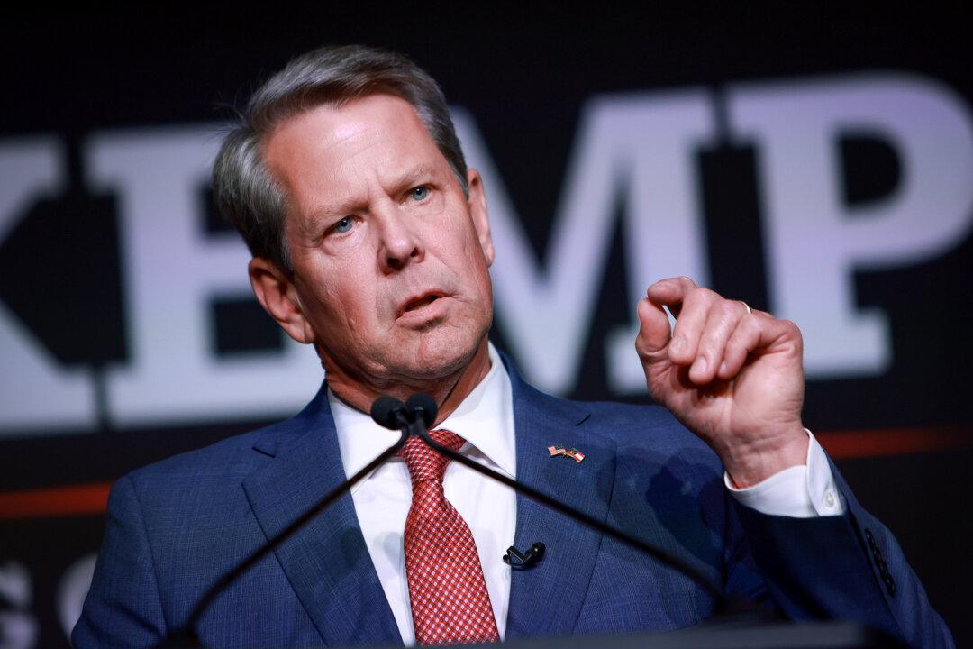 Georgia Gov. Kemp Signs Bills Aimed at Bolstering Election Integrity, Prompting ACLU Legal Threat