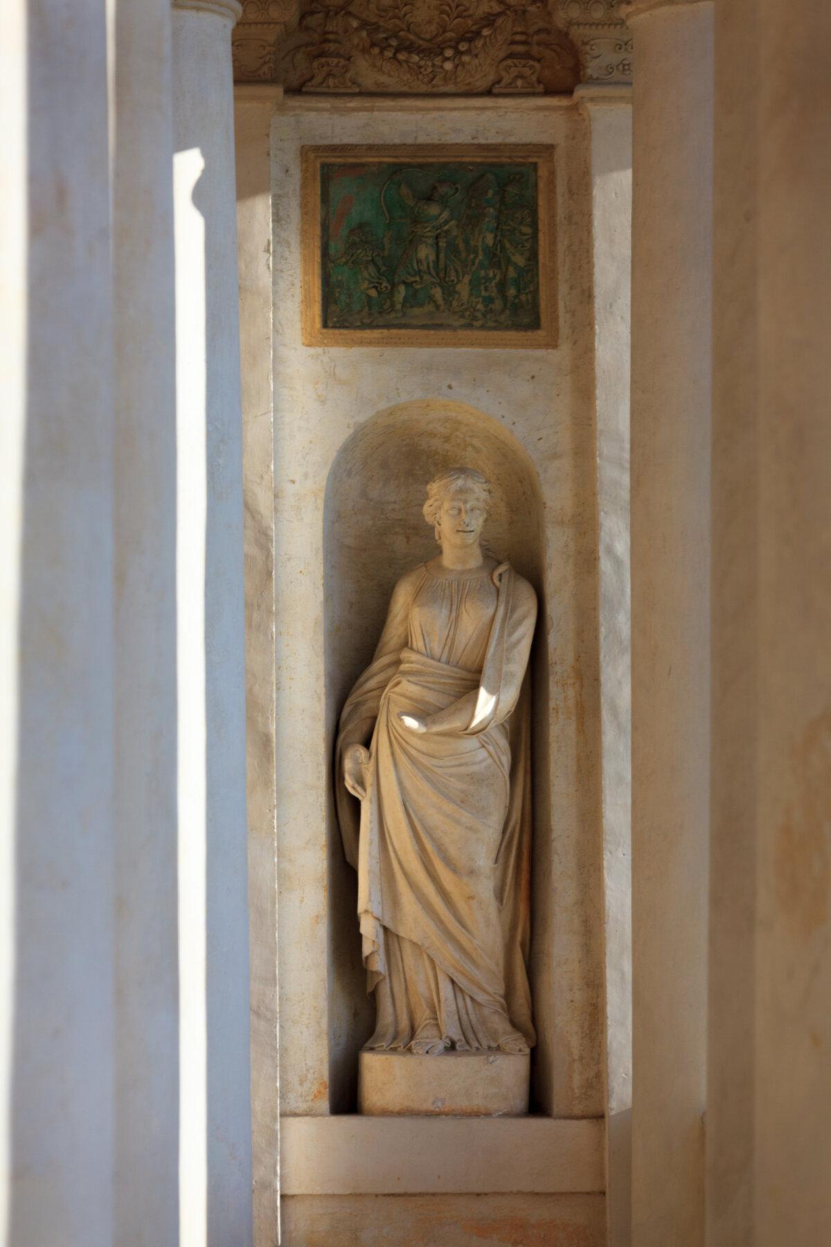 In the Loggia of David, set within a niche between the rows of columns, Virtue, in the guise of a maiden, stands, gracefully animating the space. (J. H. Smith)