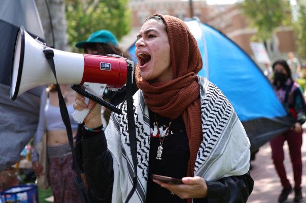 Pro-Palestine demonstrators march at an encampment in support of Gaza at the University of Southern California in Los Angeles on April 24, 2024. (Mario Tama/Getty Images)